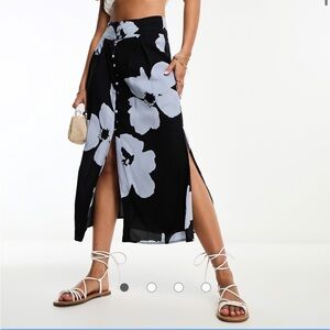ASOS DESIGN button up midi skirt with split in dark blue floral print